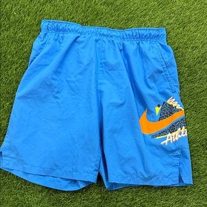 Nike Men's Dri-FIT Flex Woven Shorts with a retro graphic logo